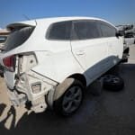  صدام خلفي كيا كارينس 2015